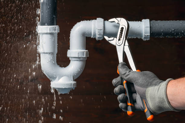 Professional Drain Cleaning technician working in Cascade, WI